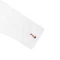 White long-sleeve shirt featuring a stylish red 'J' heart logo on the cuff.