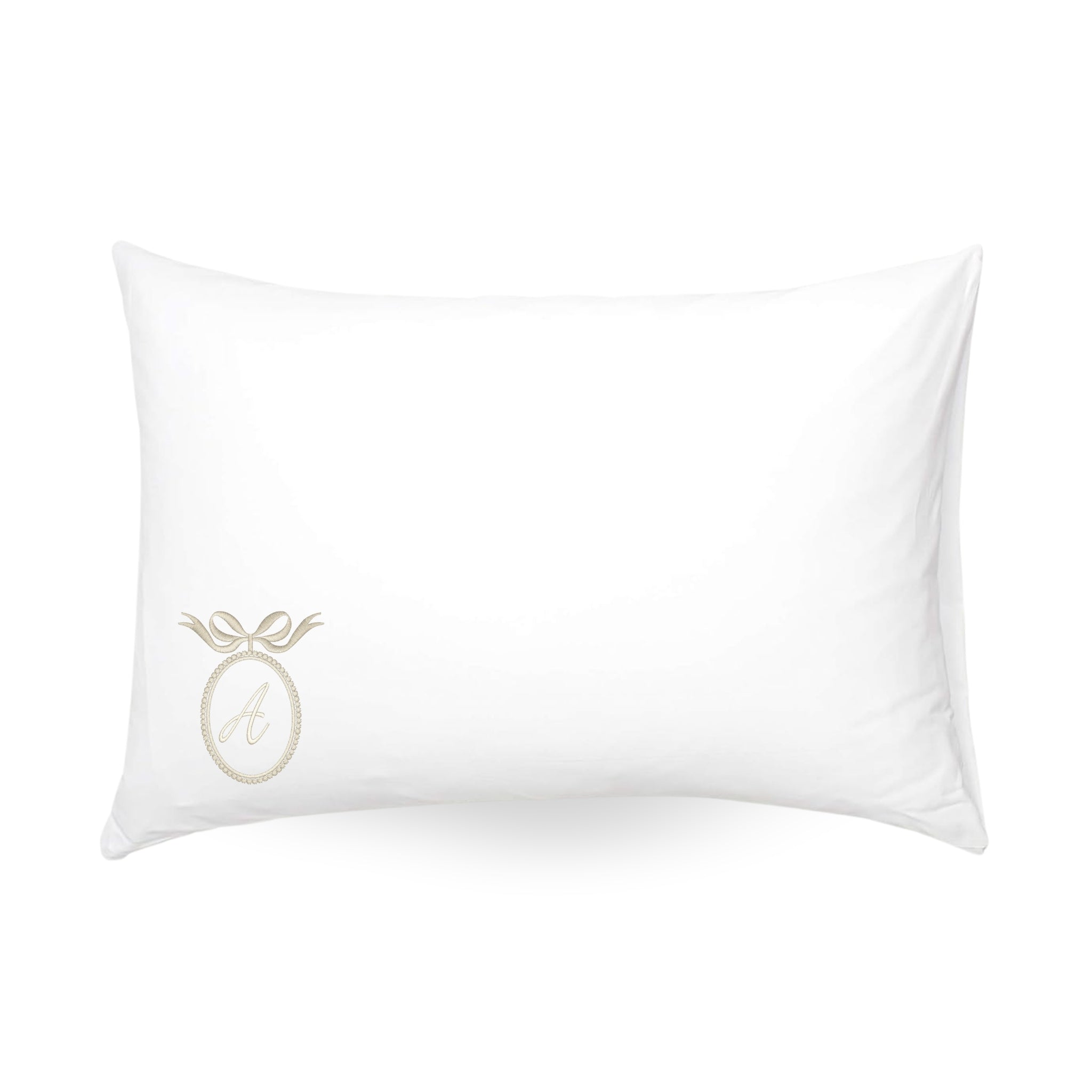 Personalized white pillowcase with elegant monogram and bow design, perfect for home decor.