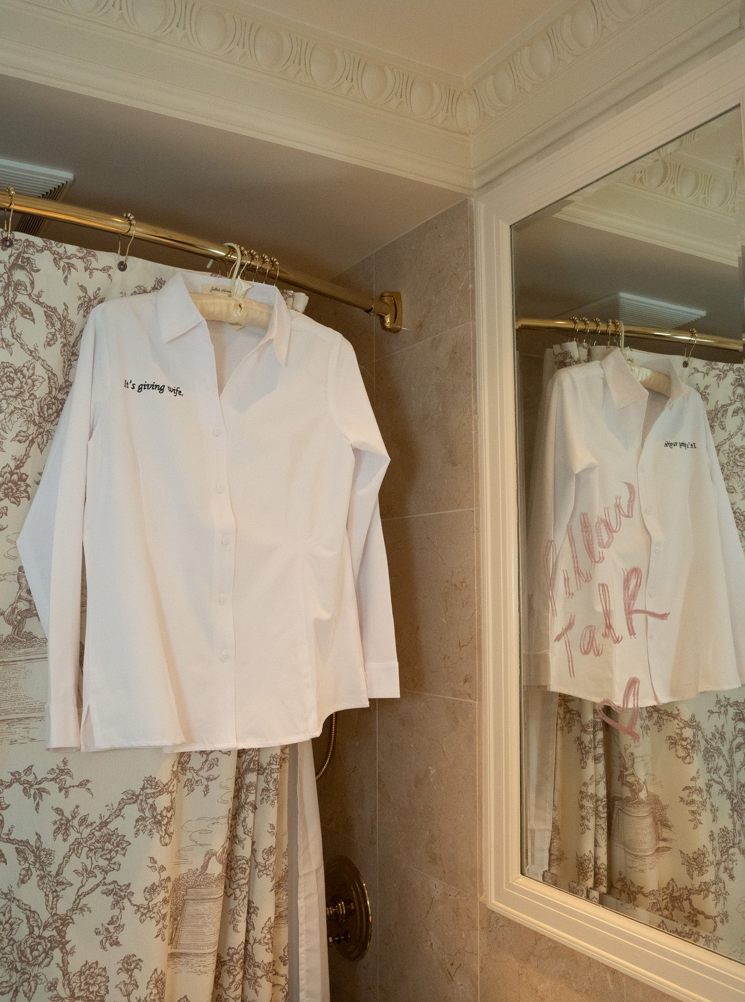 White button-up shirt with 'It's giving wife' text, perfect for stylish casual or bridal wear.