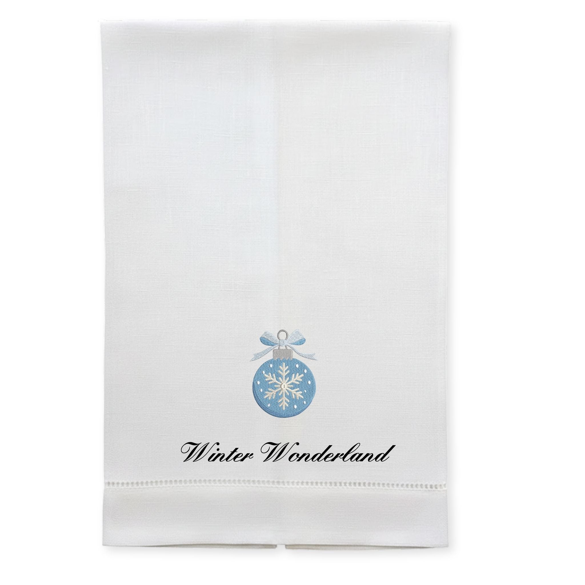 White holiday kitchen towel featuring blue snowflake ornament design and 'Winter Wonderland' text.