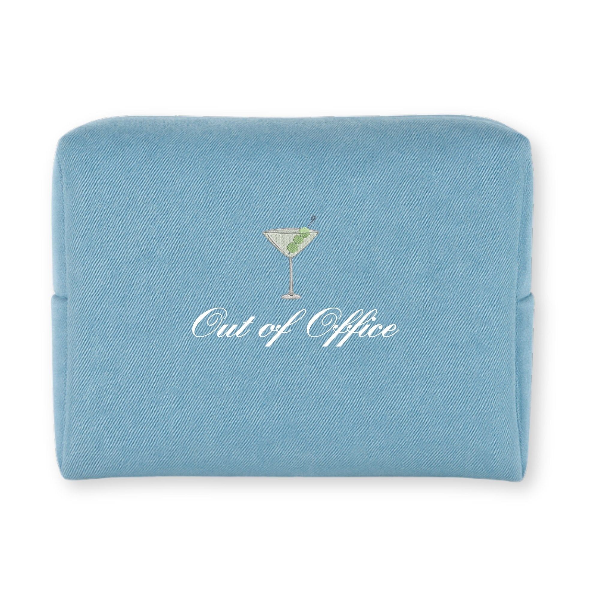 Light blue canvas cosmetic bag with 'Out of Office' text and martini graphic.
