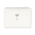 Embroidered cocktail napkin featuring a martini glass with olives, elegant cream color.