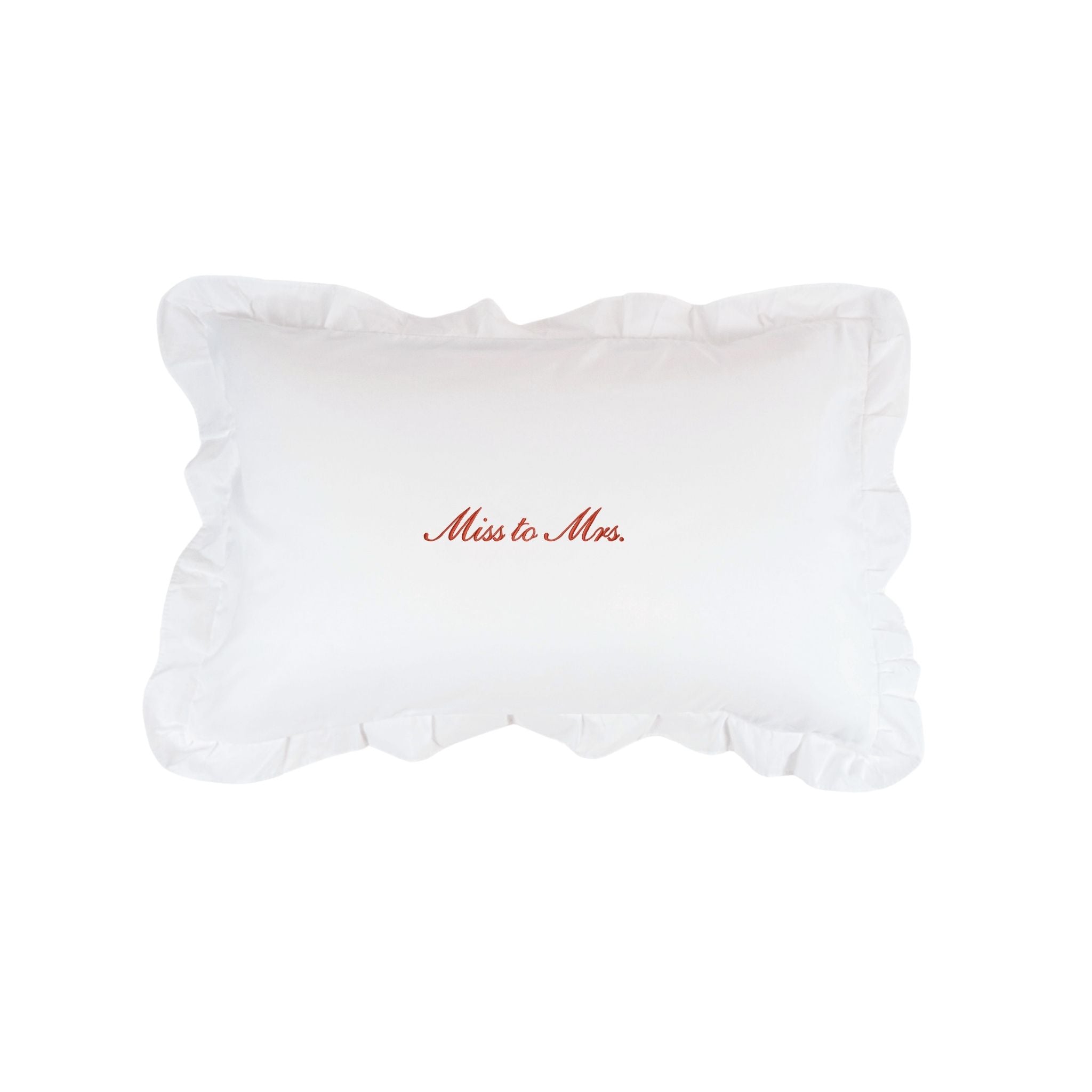 White pillow with 'Miss to Mrs.' text on a white background