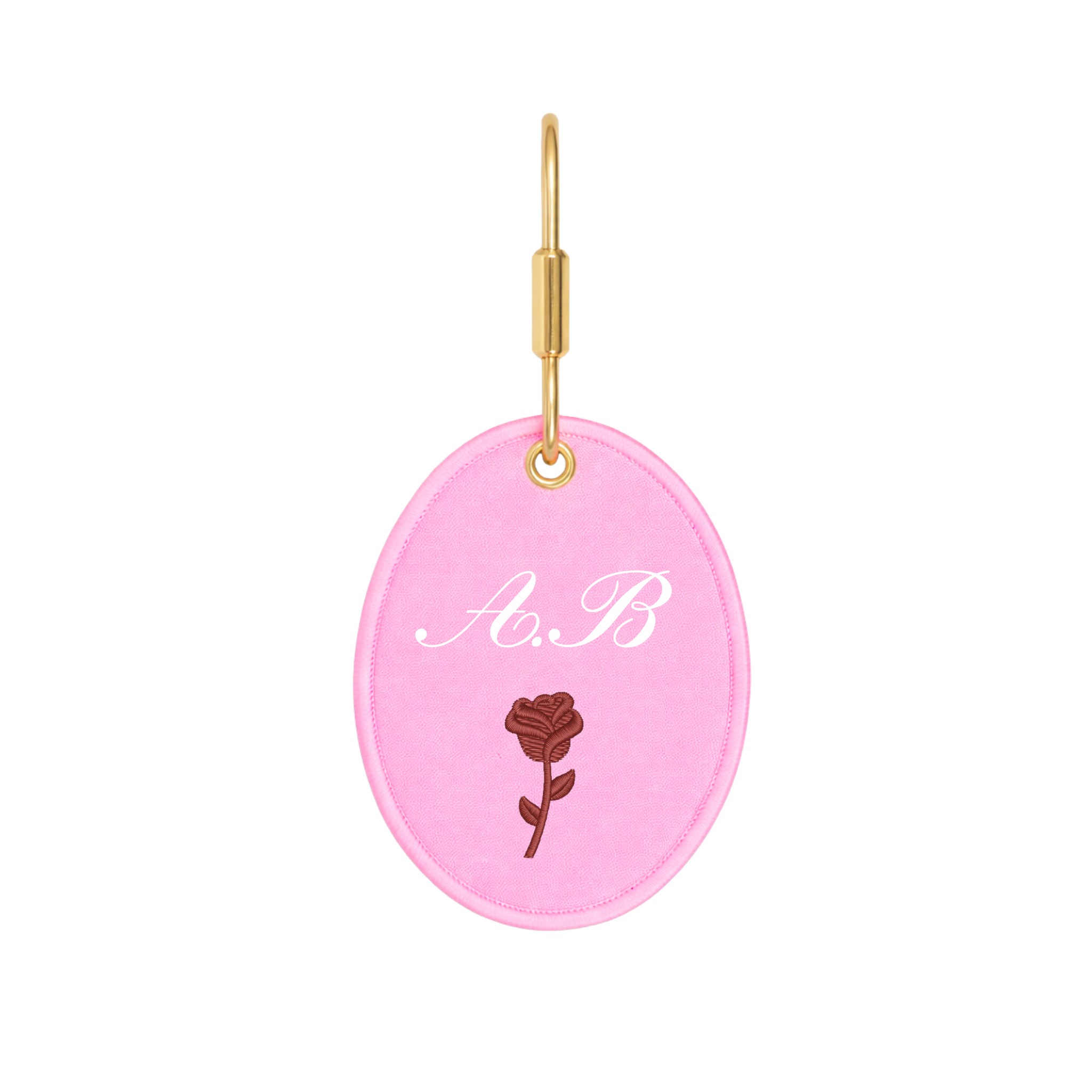 Personalized pink leather keychain with embossed rose and initials A.B.
