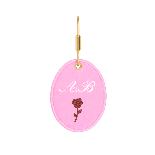 Personalized pink leather keychain with embossed rose and initials A.B.