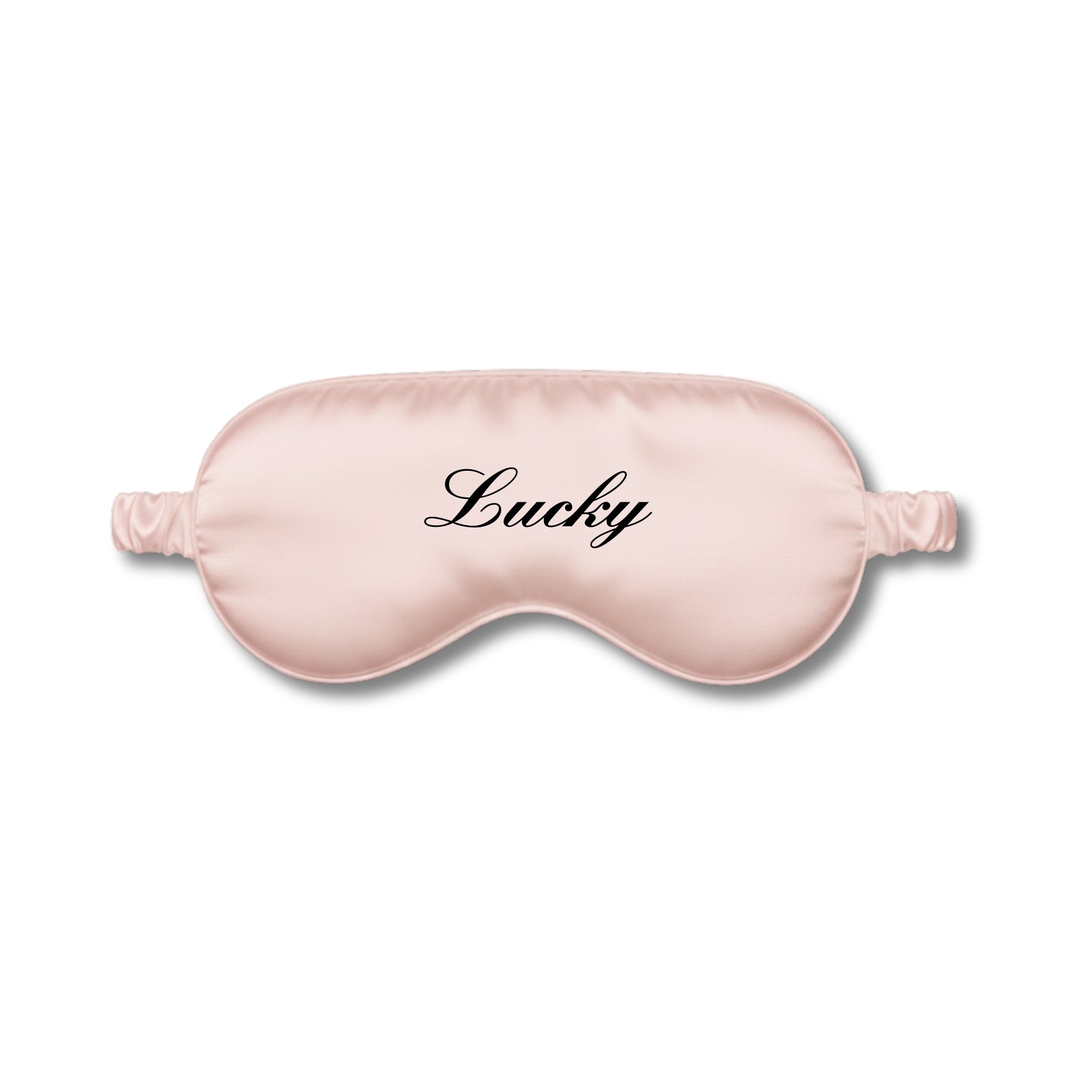 Pink sleep mask with 'Lucky' text on a white background